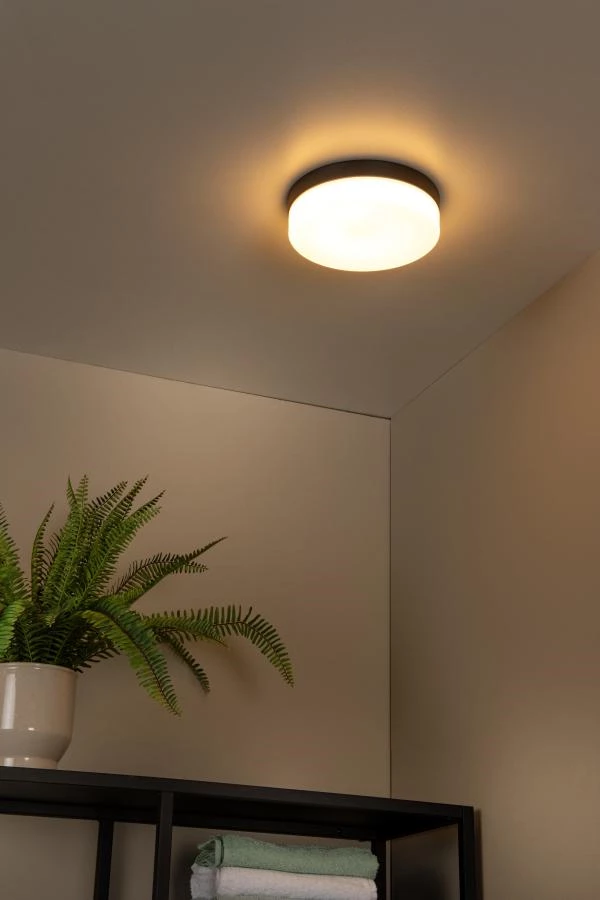 Lucide BISKIT - Flush ceiling light Bathroom - Ø 28 cm - LED - 1x18W 2700K - IP44 - Motion Sensor - Black - atmosphere 1